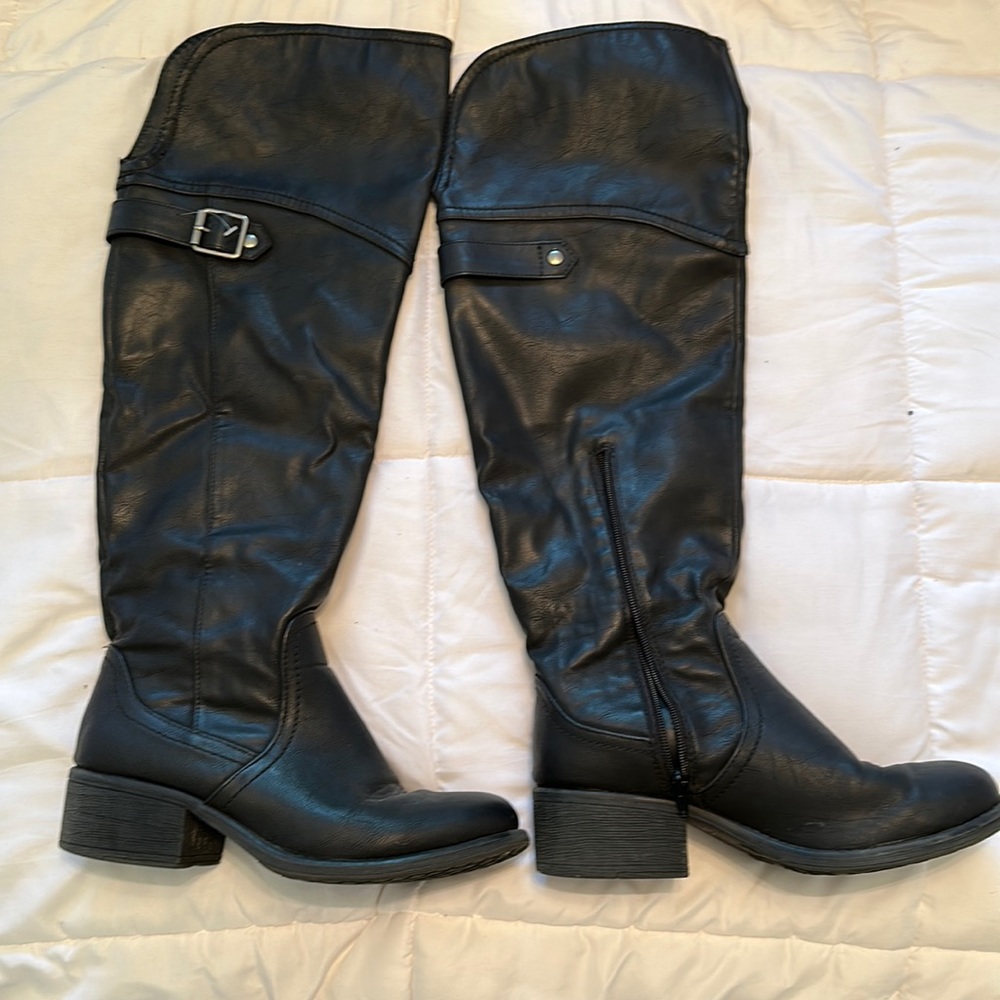 Women’s over the knee, black boot size 9 1/2